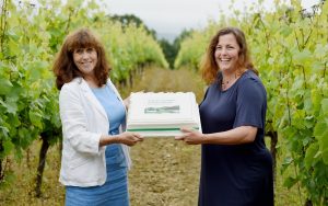 The Sussex Food & Drink Awards Big Reveal held at Ridgeview Vineyard where the finalists for the 6 categories were announced Hilary Knight and Paula Seager with the South Downs Food Finder Cake (For details contact Paula Seager / Natural PR 07830300469) Photograph taken by Simon Dack